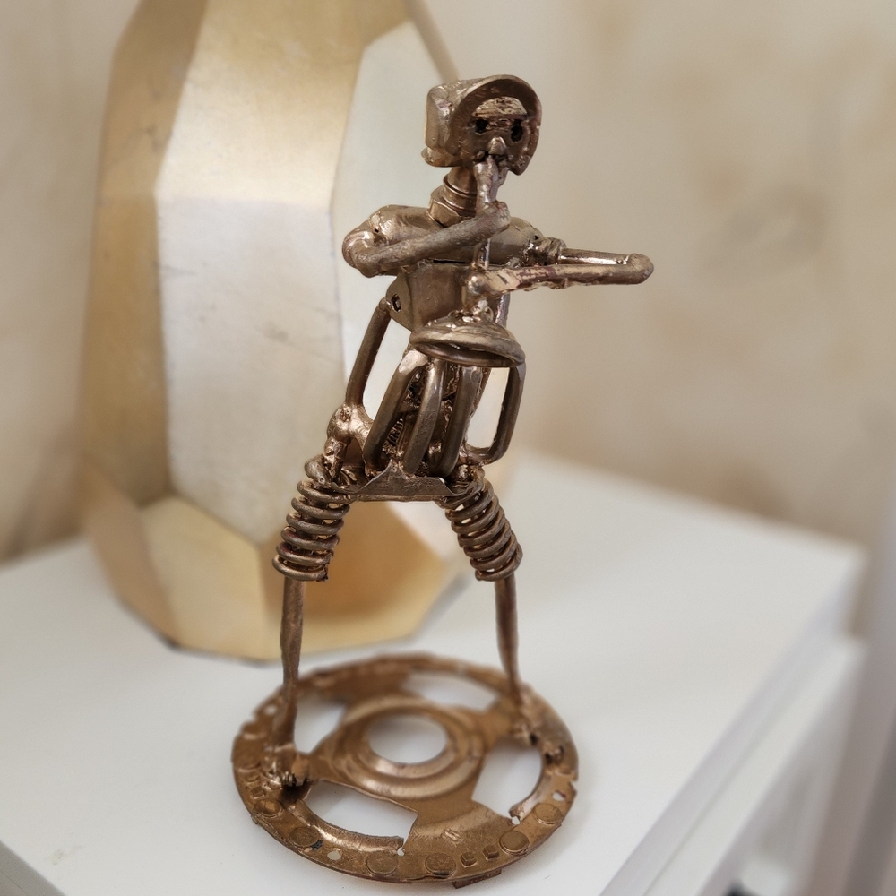 Handcrafted Metal Musician Statue, Unique Décor "The Brass Virtuoso"